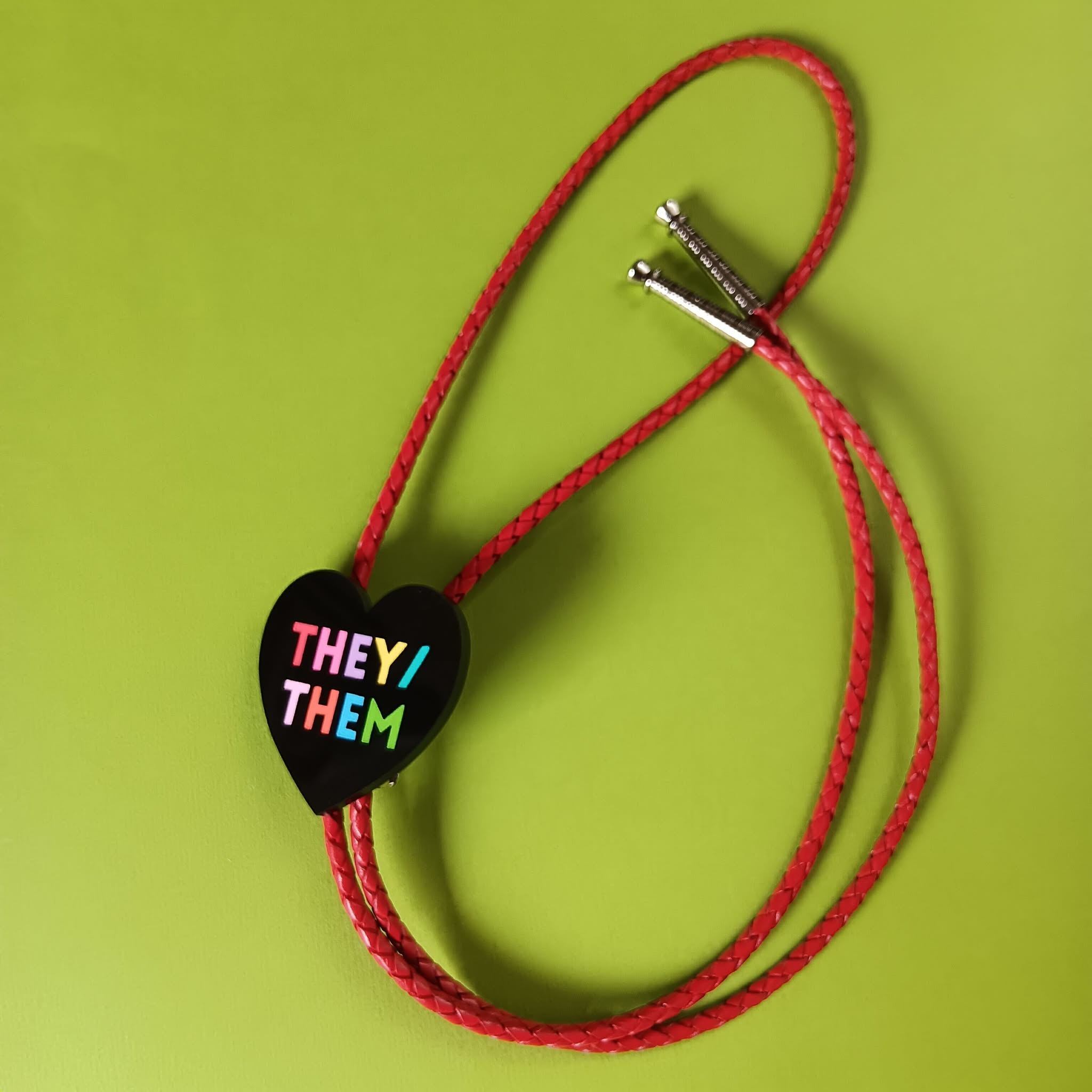 PRONOUN HEART BOLO TIE